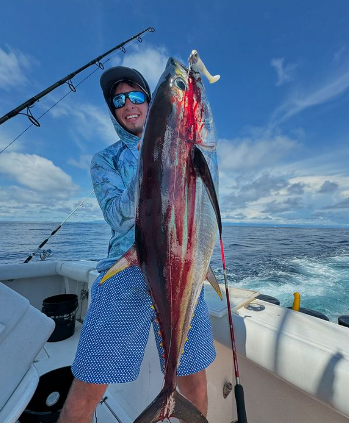 A lone fisherman in FL reeling in a 41-inch fish