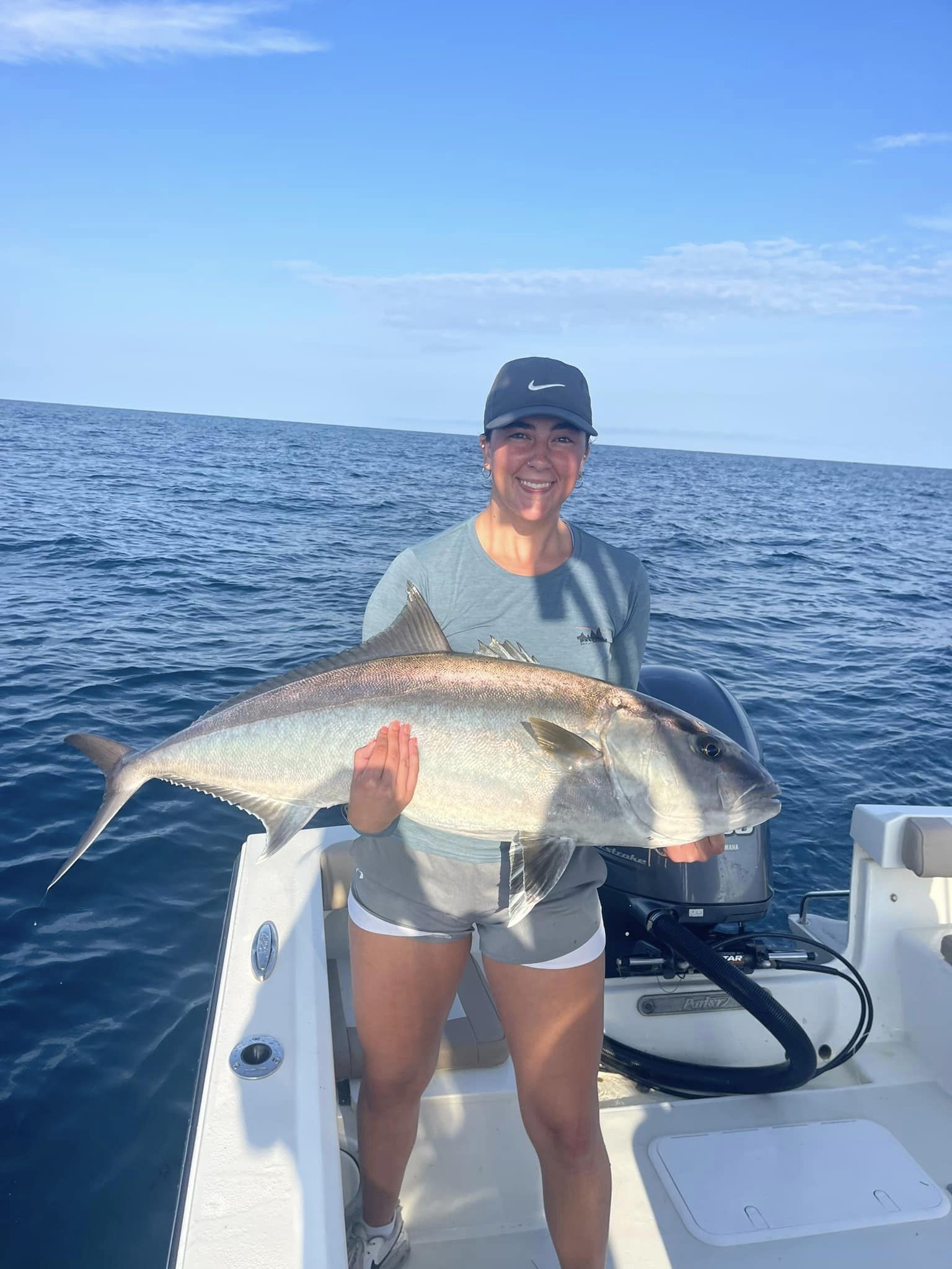 Angler reeling in big fish in Florida