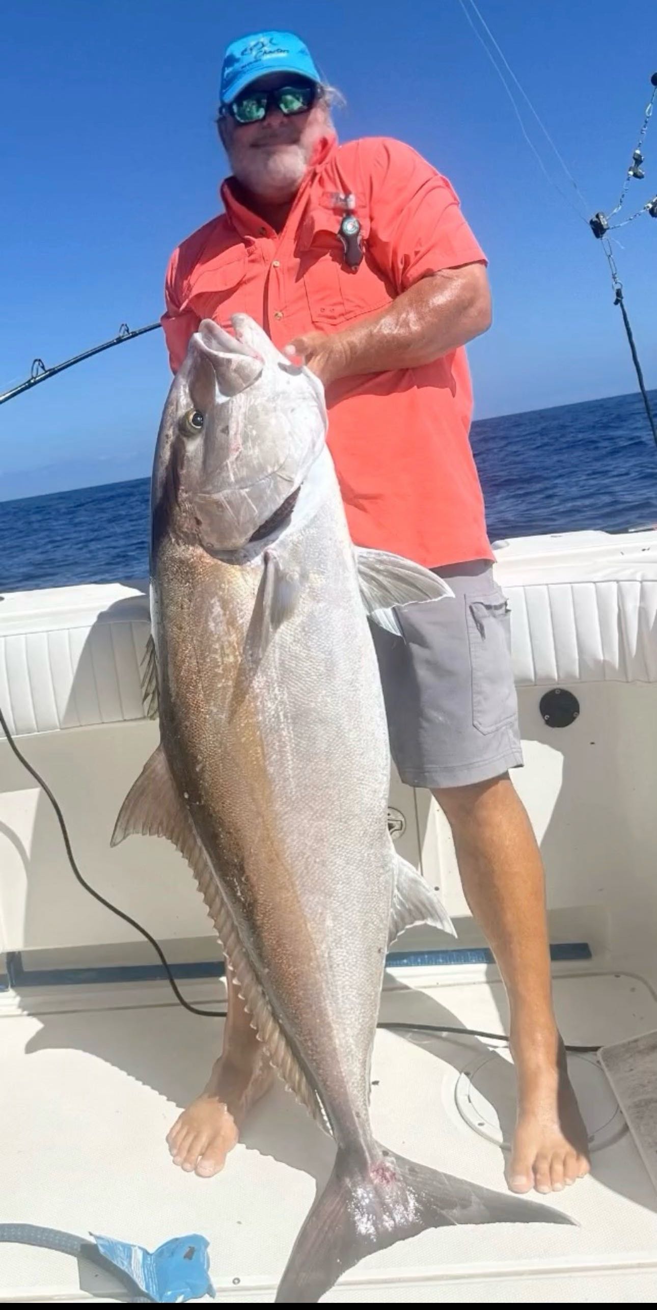 Large Greater Amberjack caught fishing in Port Isabel TX displayed on boat deck