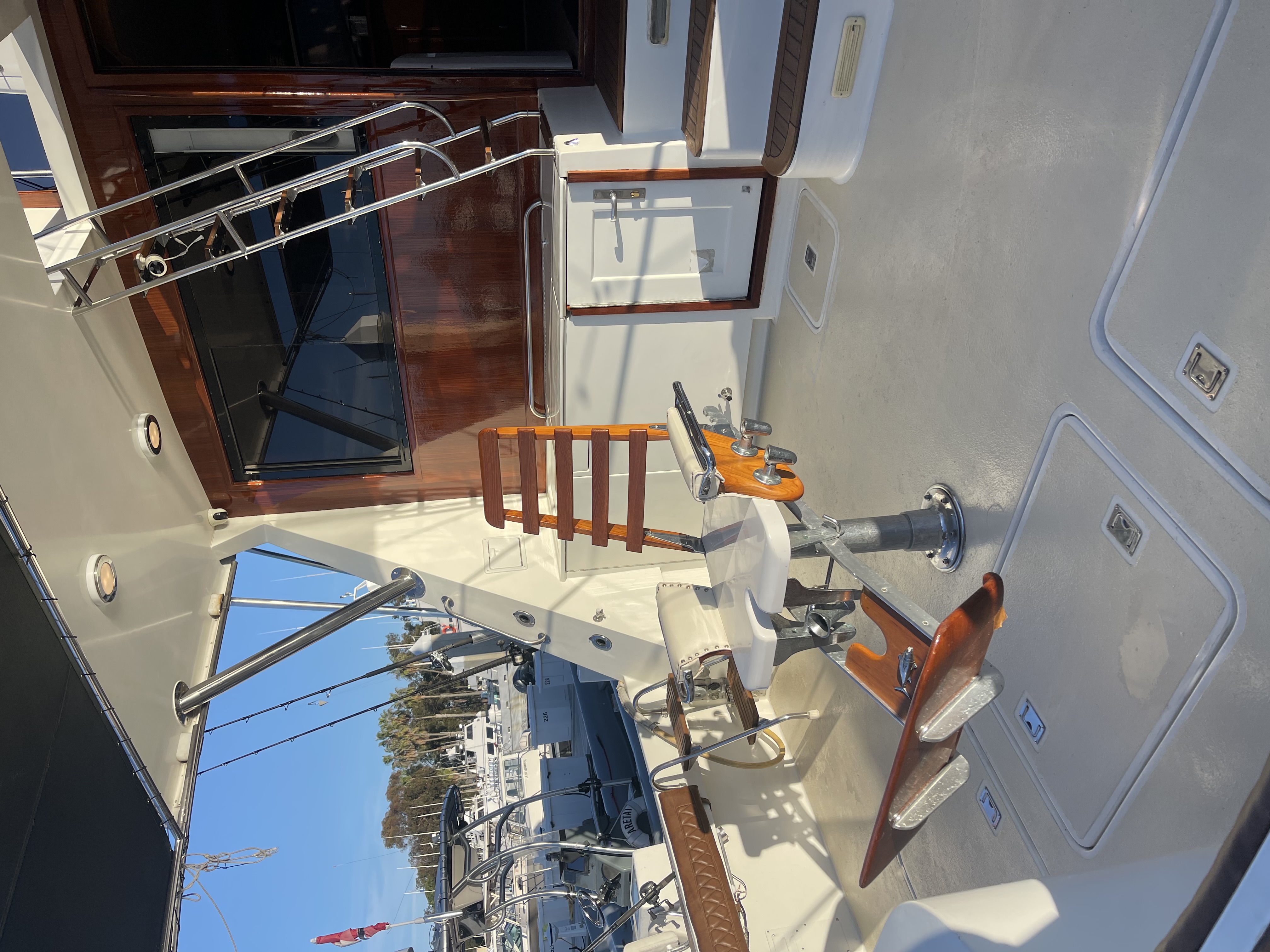 Fishing boat deck with captain's chair and equipment in San Diego CA