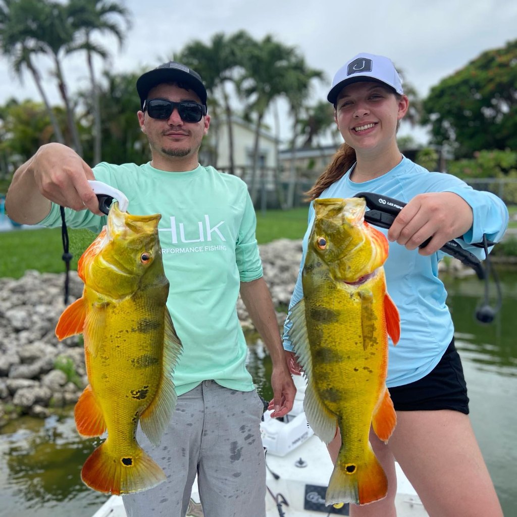 Two anglers holding big fish in Florida