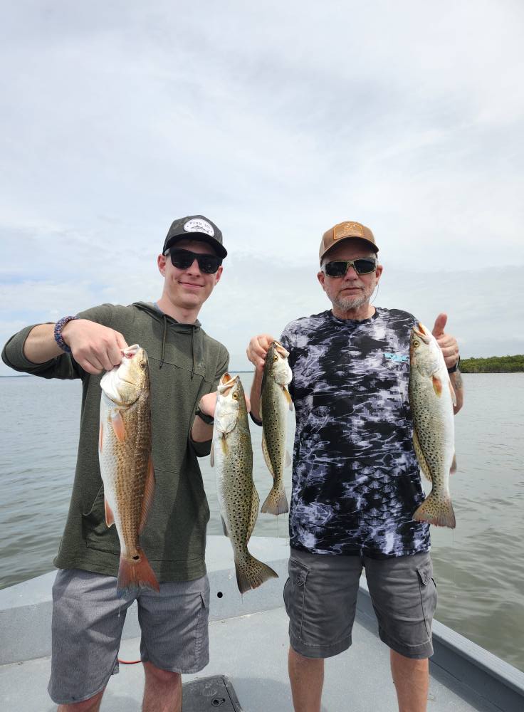 Two people fishing for redfish and spotted weakfish in Crystal River