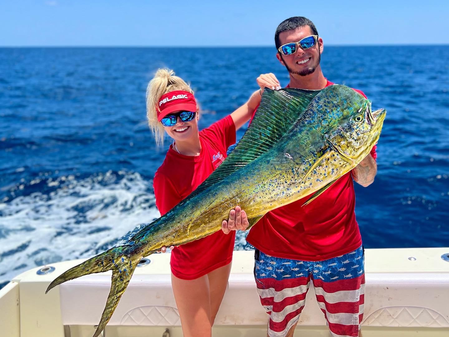 Photo of a 44-inch Mahi Mahi fish caught by two people in Tavernier