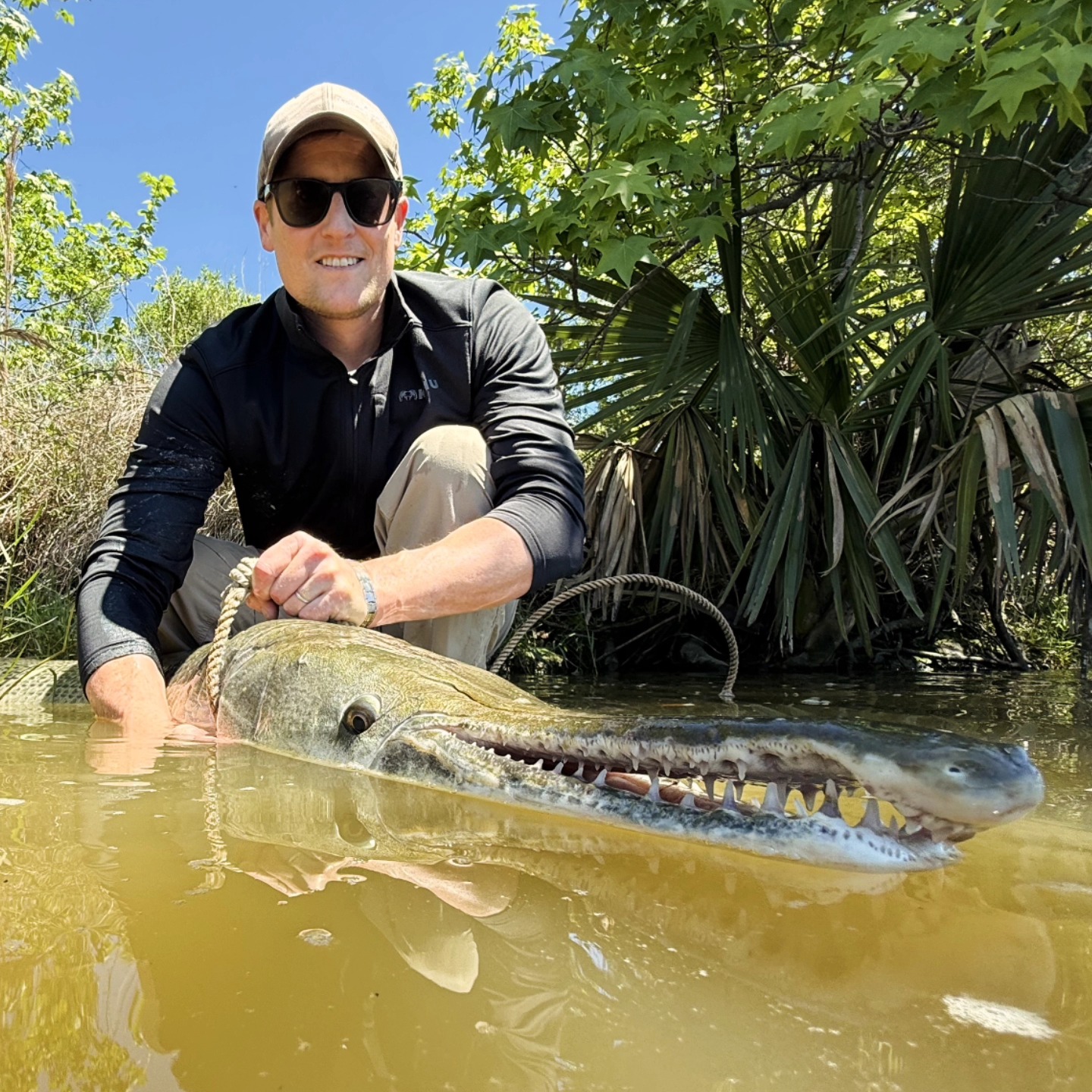 Alligator gar caught fishing in Houston TX showing impressive size and teeth