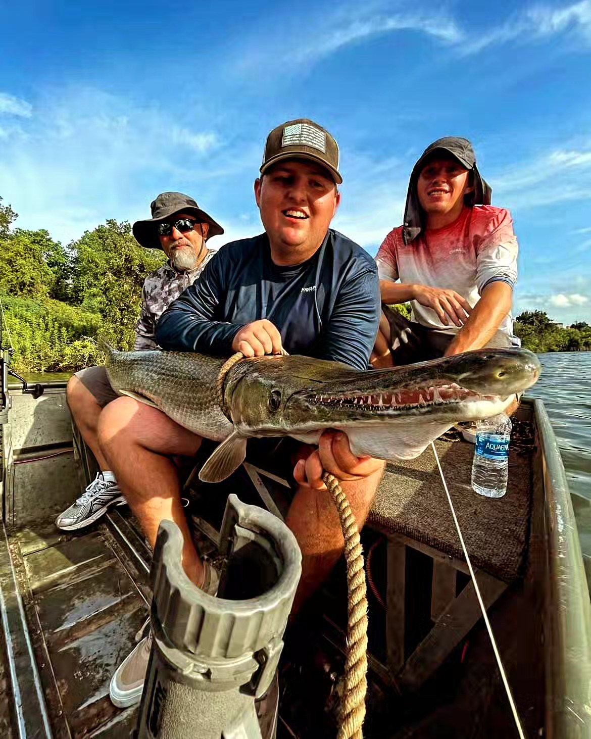 Buffalo Bayou alligator gar fishing charter boat in downtown Houston urban waters