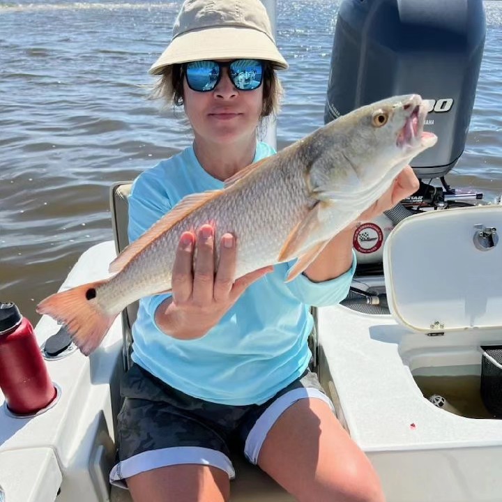 A fisherman with a big fish in NC