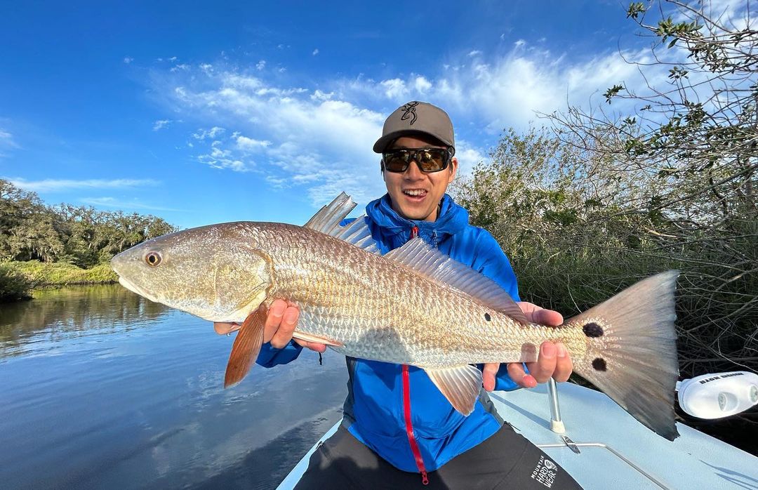 Fisherman with a large redfish catch in Palm Coast