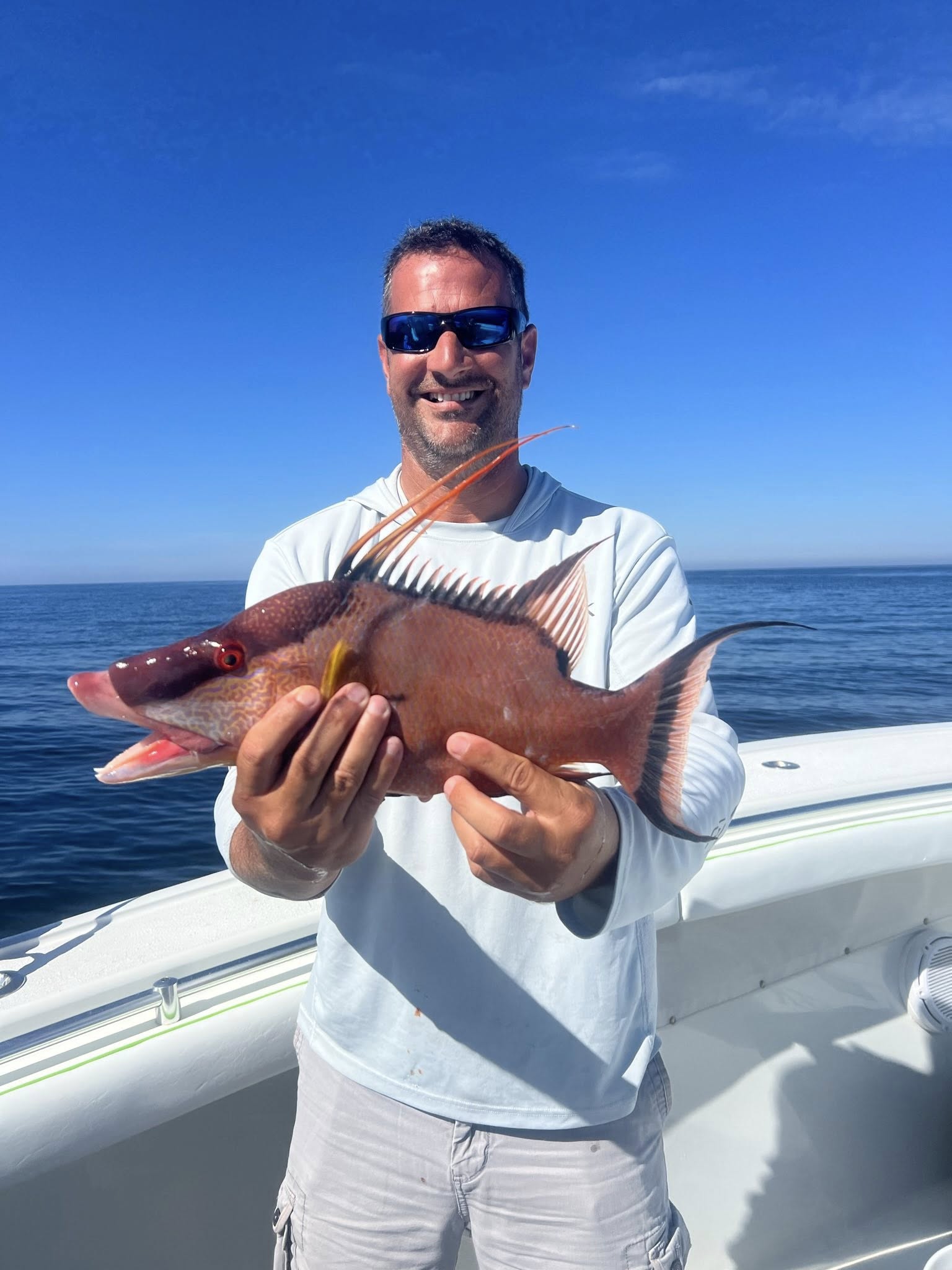 A person enjoying a fishing tour in FL