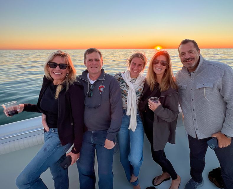 Private sunset cruise boat charter in Treasure Island FL waters with scenic coastal views