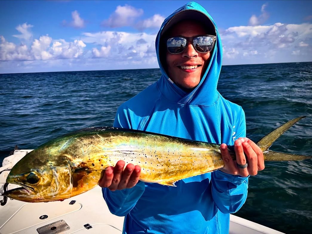 Gulf Breeze inshore fishing charter boat on calm waters targeting red drum and sea trout