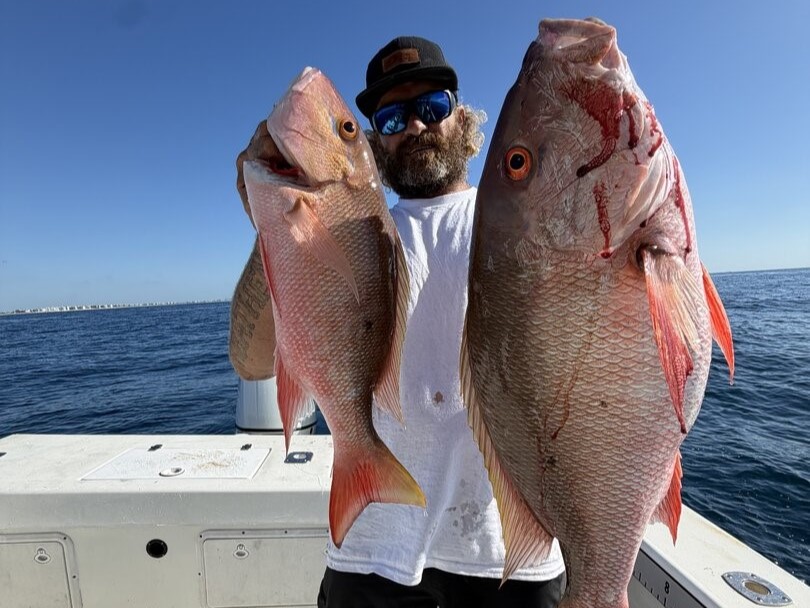 4 hour offshore fishing charter boat in Boynton Beach waters with fishing equipment ready