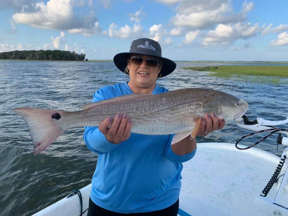 A redfish measuring 33 inches caught in Fernandina Beach