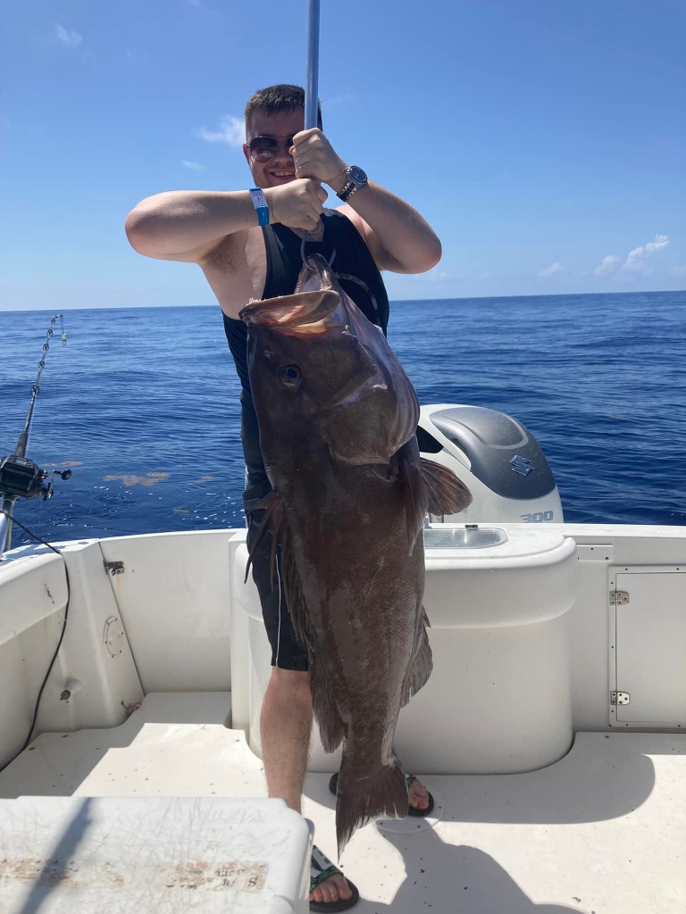 A person fishing in the waters of Marathon, Florida