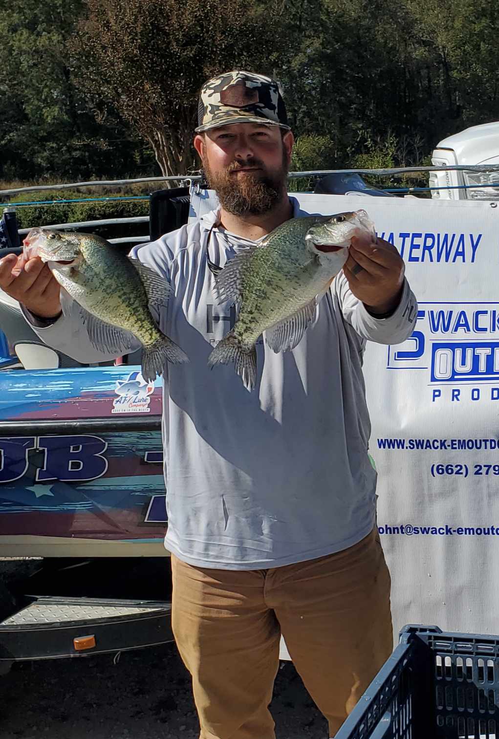 Two white crappie fish caught in Amory
