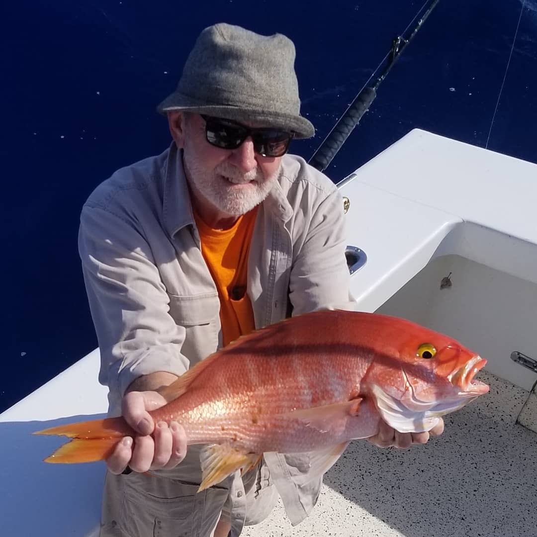 Angler catches a 13-inch fish while fishing in Islamorada