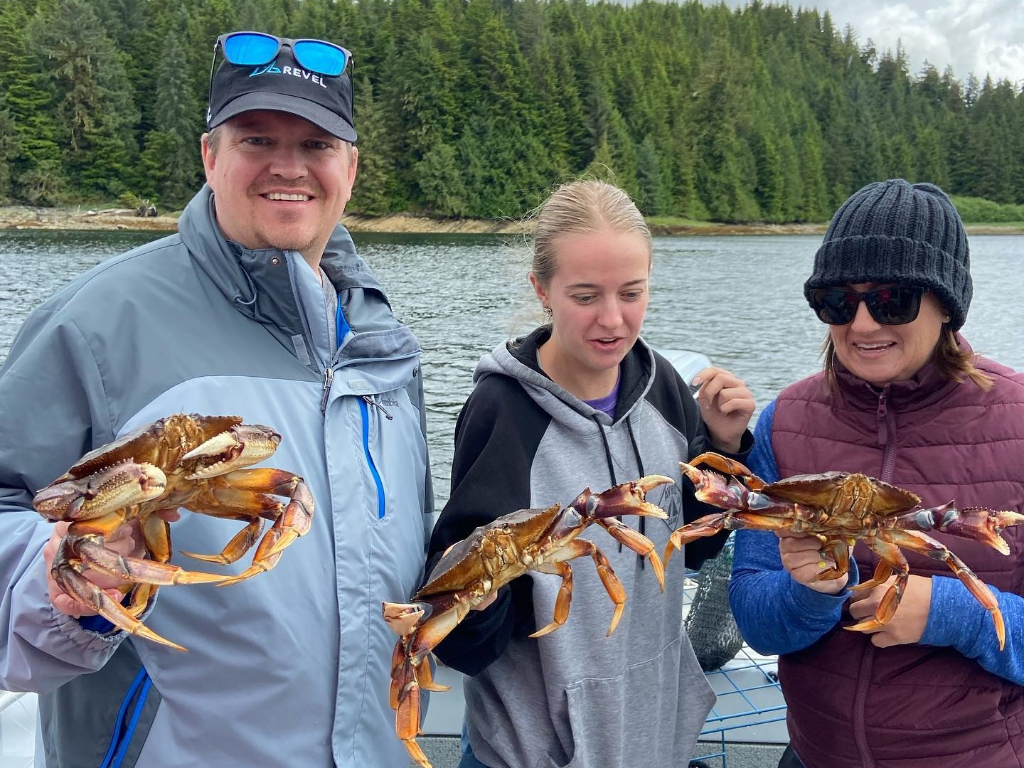Three people fishing in Ketchikan