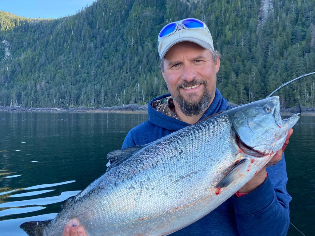A person fishing in Ketchikan