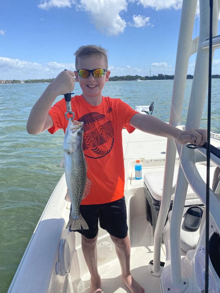 Speckled trout catch displayed on fishing boat in Sand Springs OK