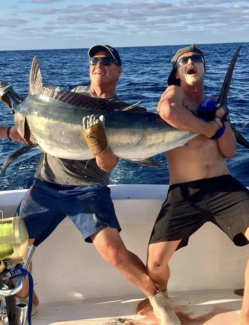 Couple's fishing adventure in the ocean
