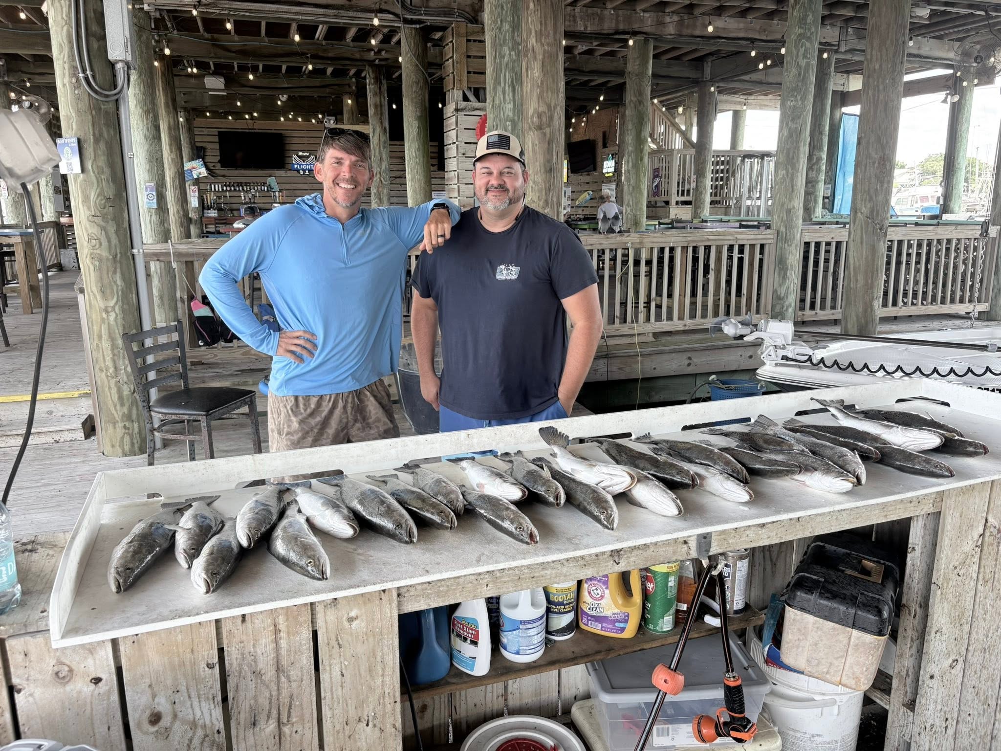Fresh caught fish displayed on cleaning table at fishing dock in Bay St. Louis MS