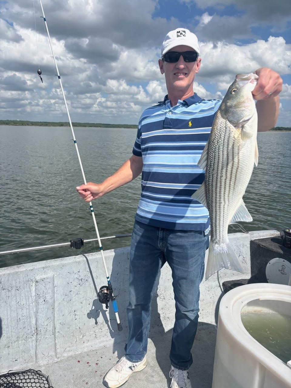 Striped bass fishing catch displayed on boat in Kingston OK