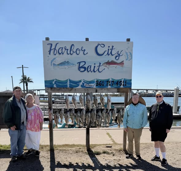 Harbor City Bait sign displaying caught fish from Rockport TX fishing trip