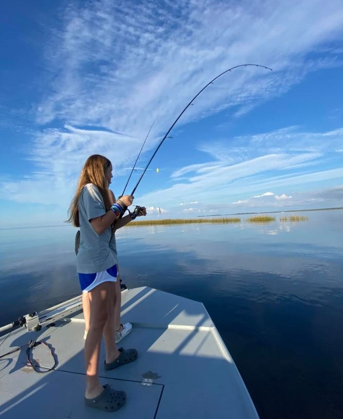 Person standing in FL location