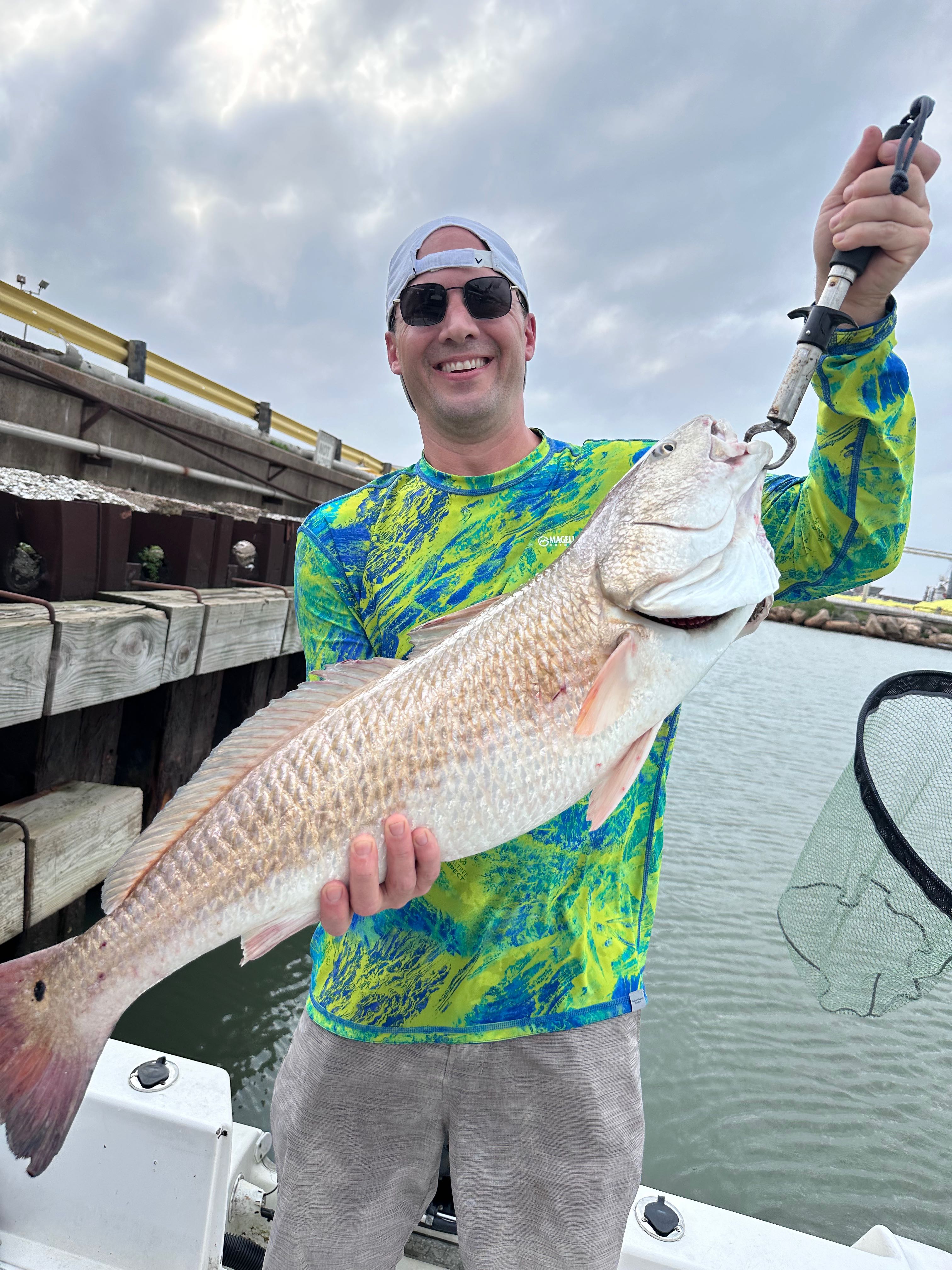 A person fishing in Galveston