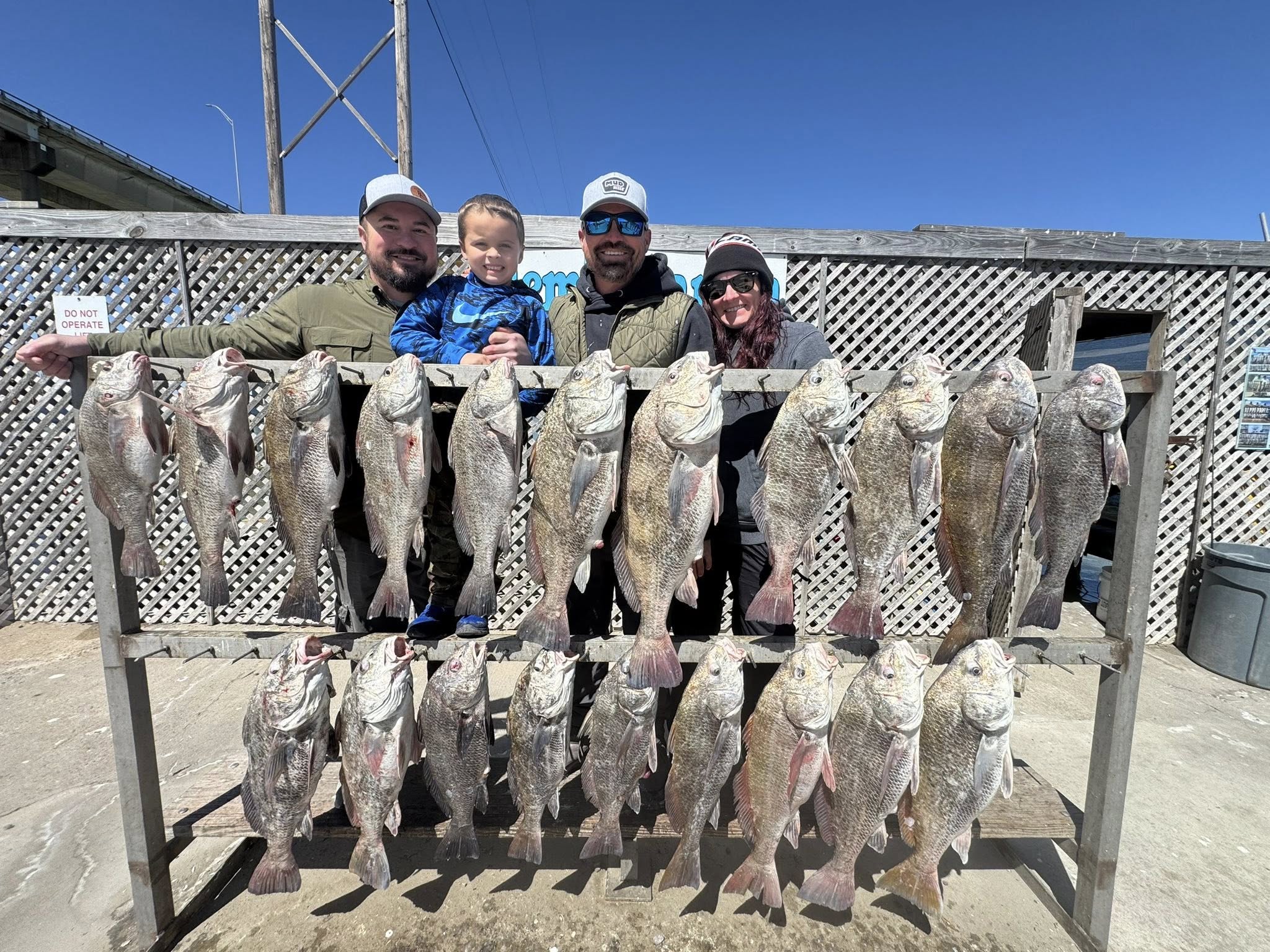 Black drum fishing catch displayed on wooden rack in Corpus Christi TX