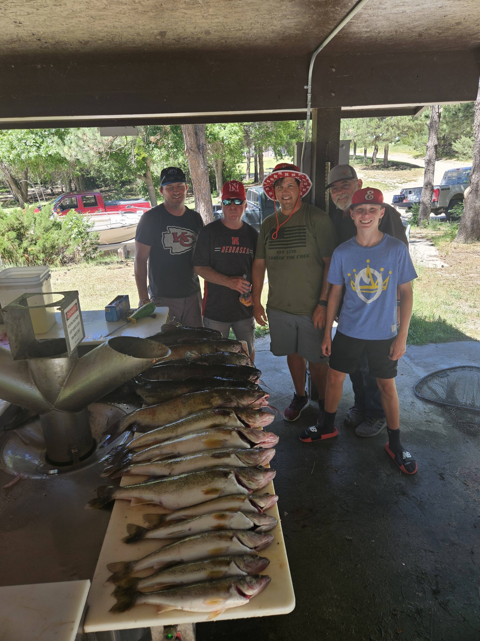 Fresh caught sauger and walleye fish displayed on cleaning table at Valentine NE fishing station