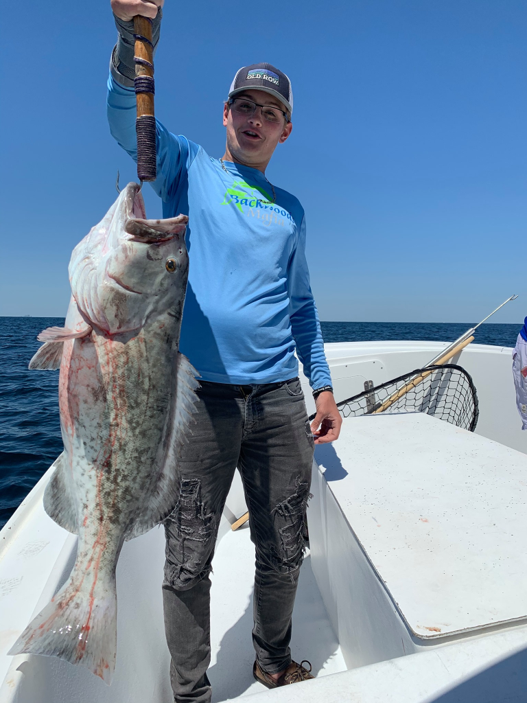 Angler with a 36-inch fish caught in Destin