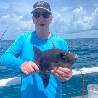 Angler with a 11-inch fish caught in FL