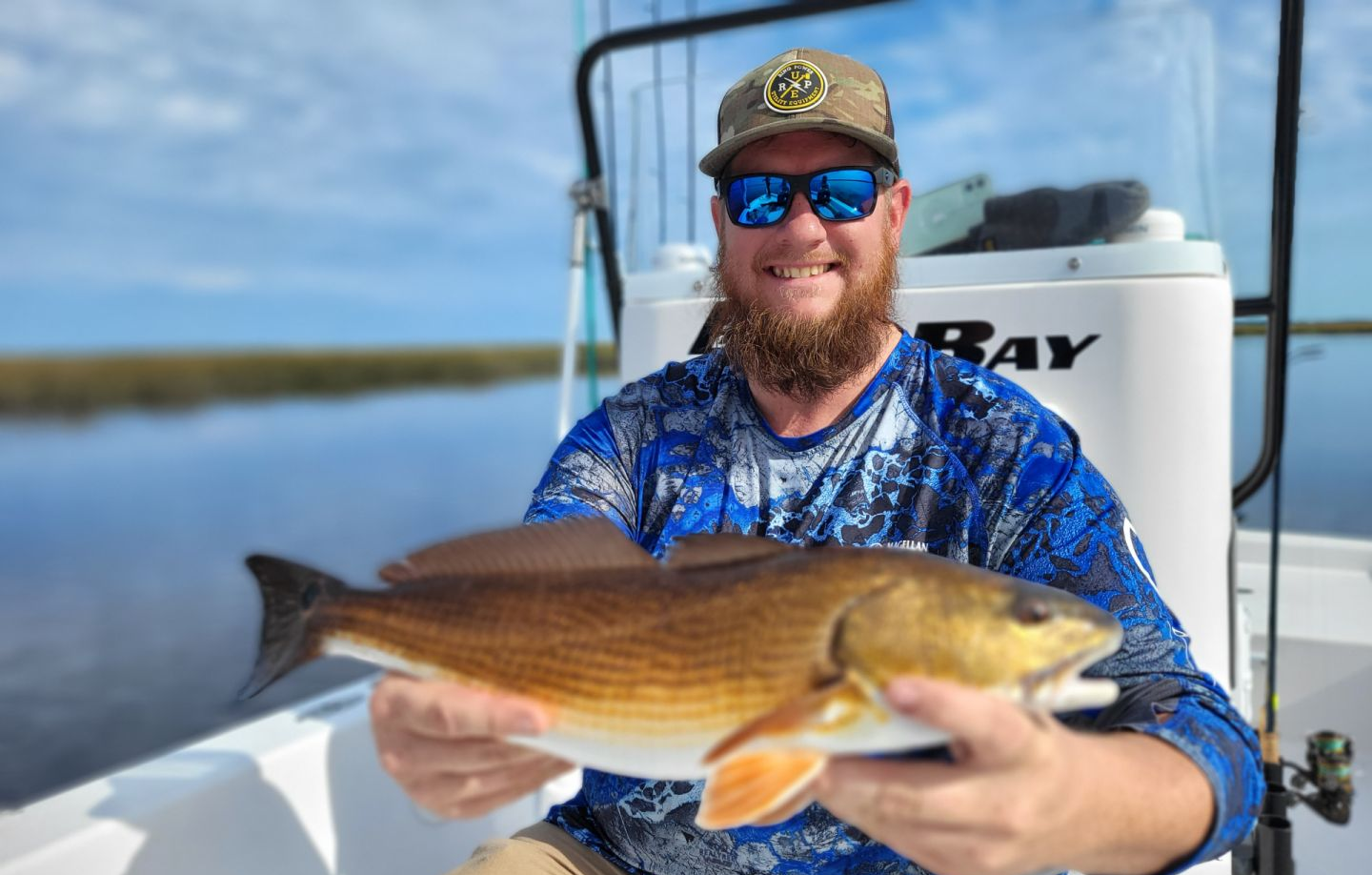 Angler with a 22-inch fish caught in FL