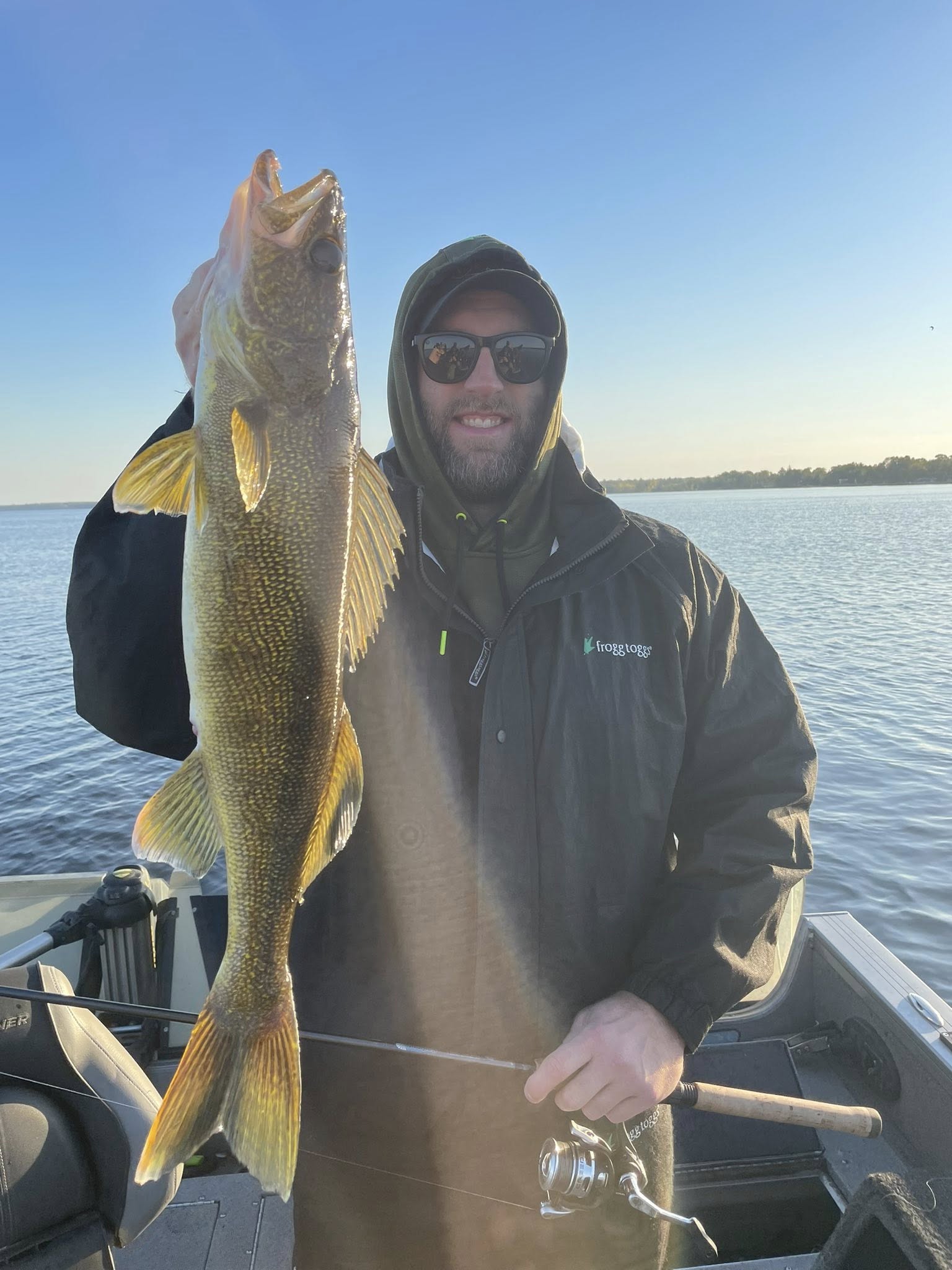 Walleye catch held up on fishing boat in Breezy Point Minnesota