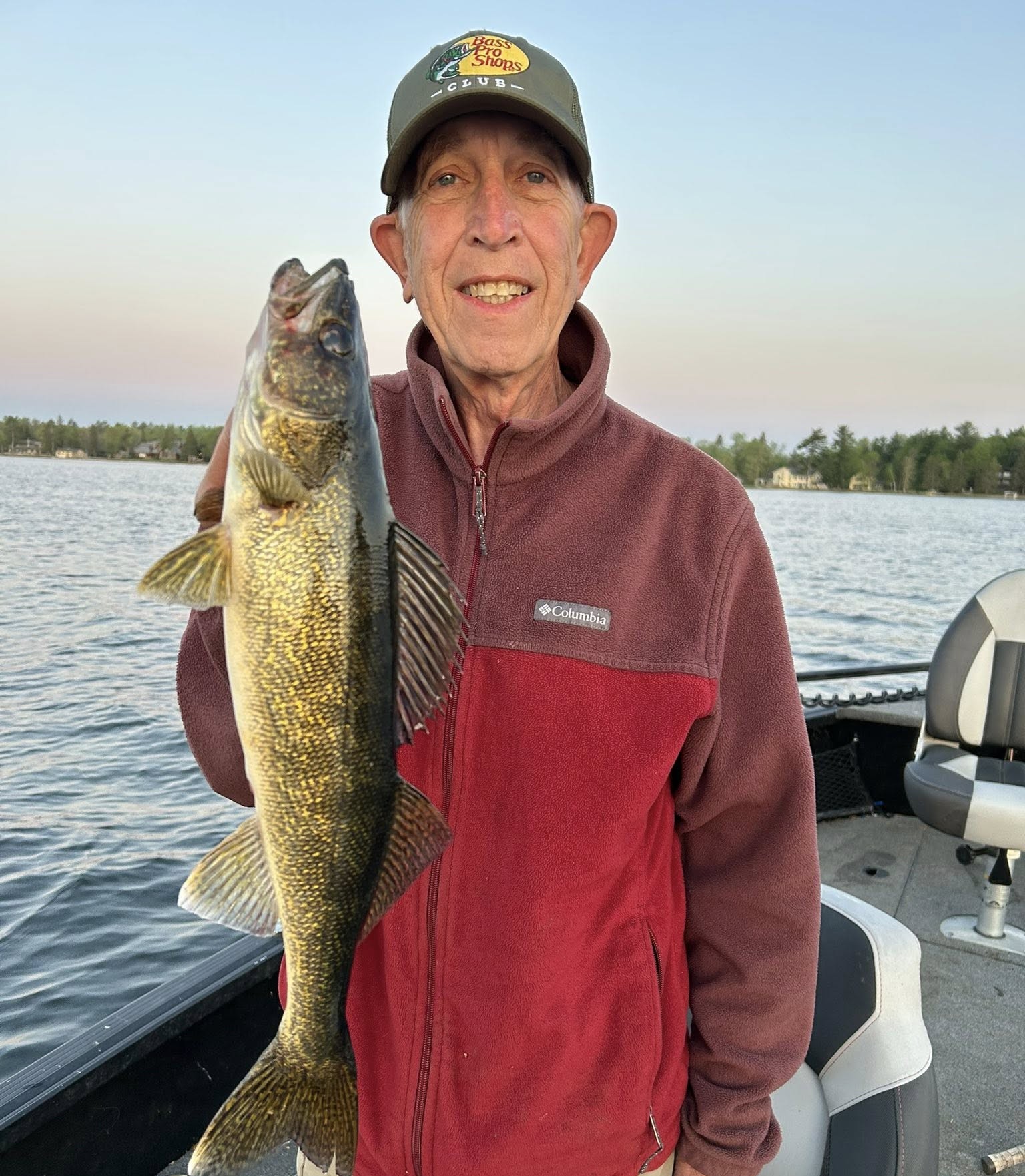 Brainerd Lakes Area fishing trip - 19' Alumacraft boat with guide targeting bass, pike, muskie