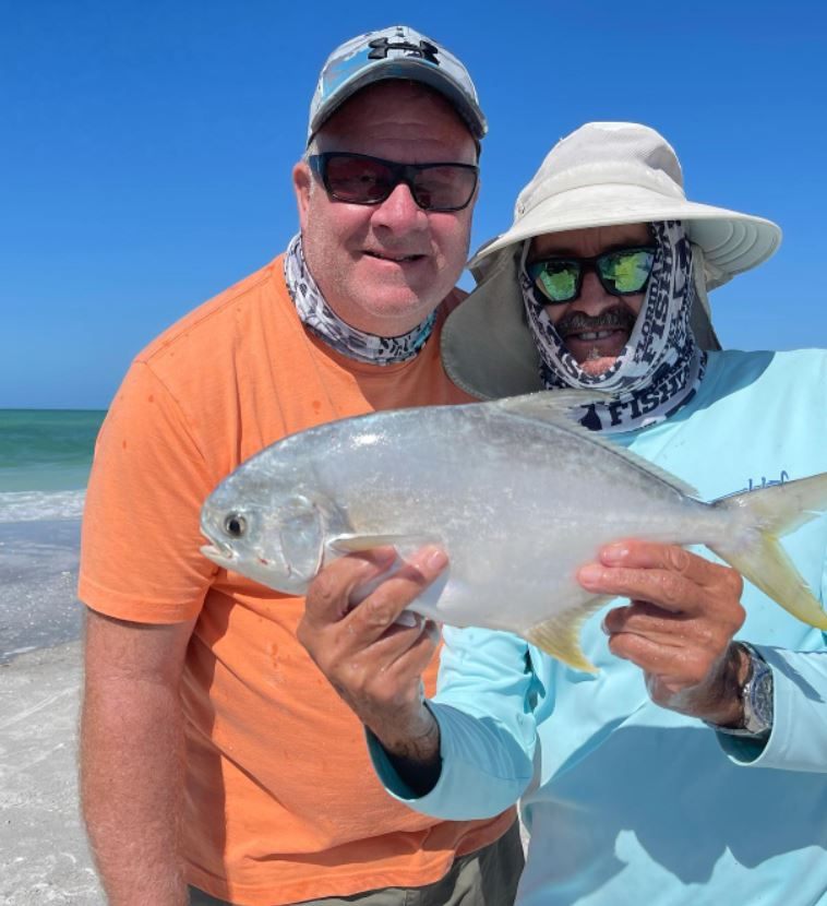A fisherman caught a Florida Pompano fish in FL