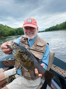 Angler with fishing rod in Maine