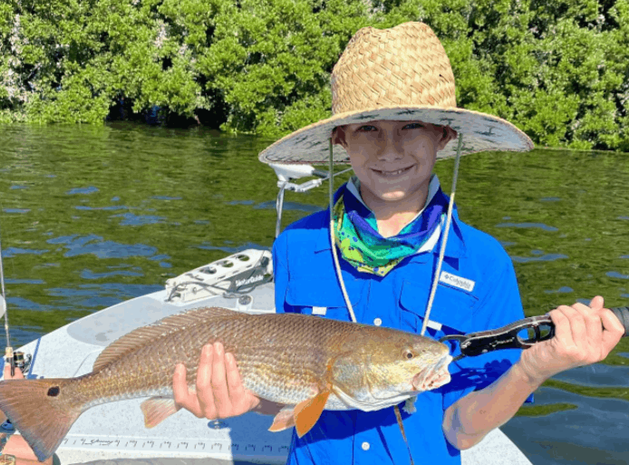 1 fisherman catching a 20-inch fish in FL
