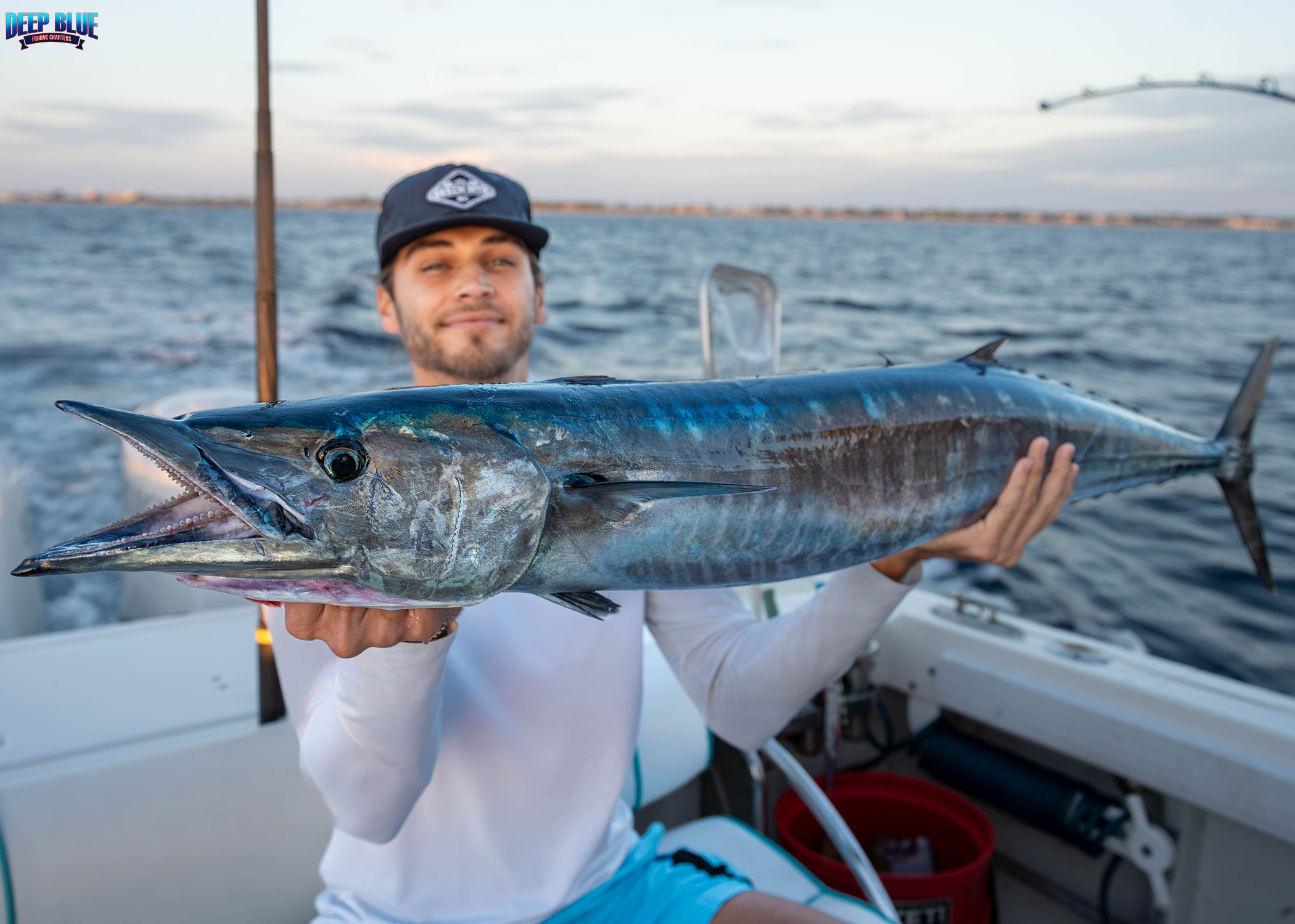 Wahoo fish caught by two people while fishing in Boynton Beach