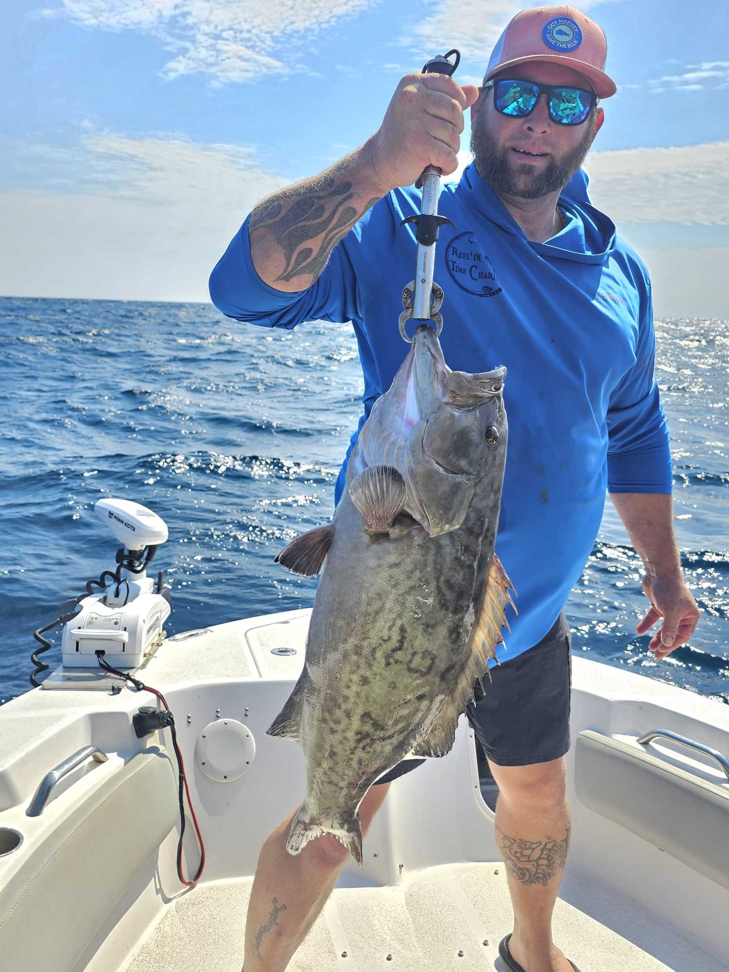 Gag grouper caught fishing in Orange Beach AL displayed on boat deck