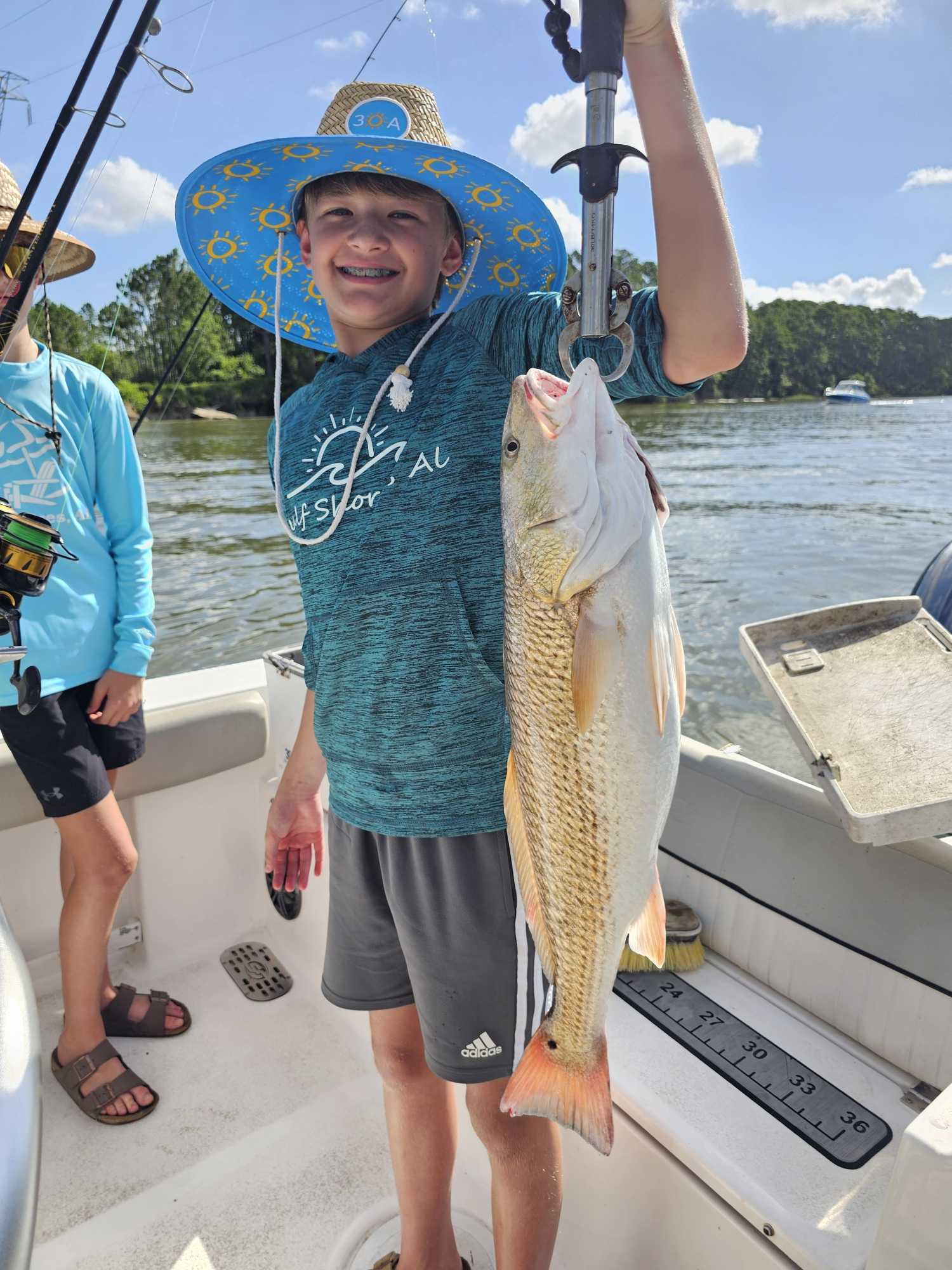 Redfish caught while fishing in Orange Beach AL displayed on boat deck