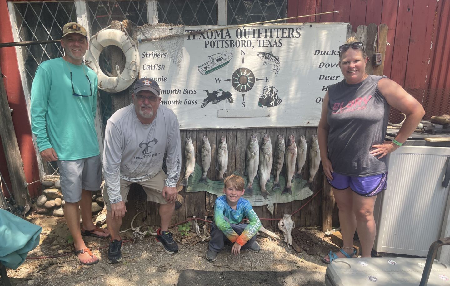 Fresh striped bass catch displayed at Trauma Outfitters fishing guide service in Pottsboro Texas