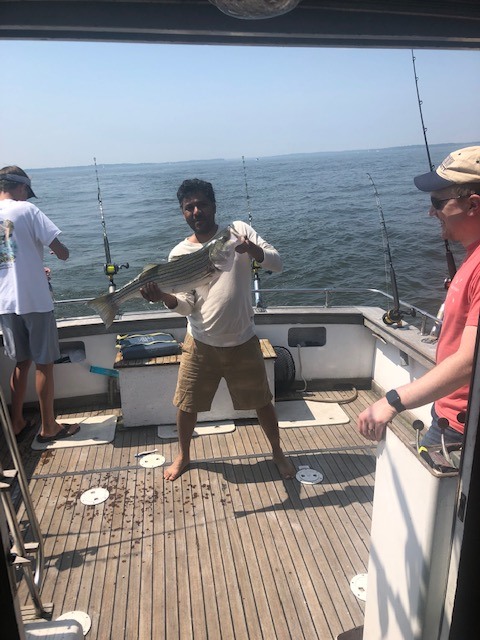 Angler holding a 22-inch fish in MD
