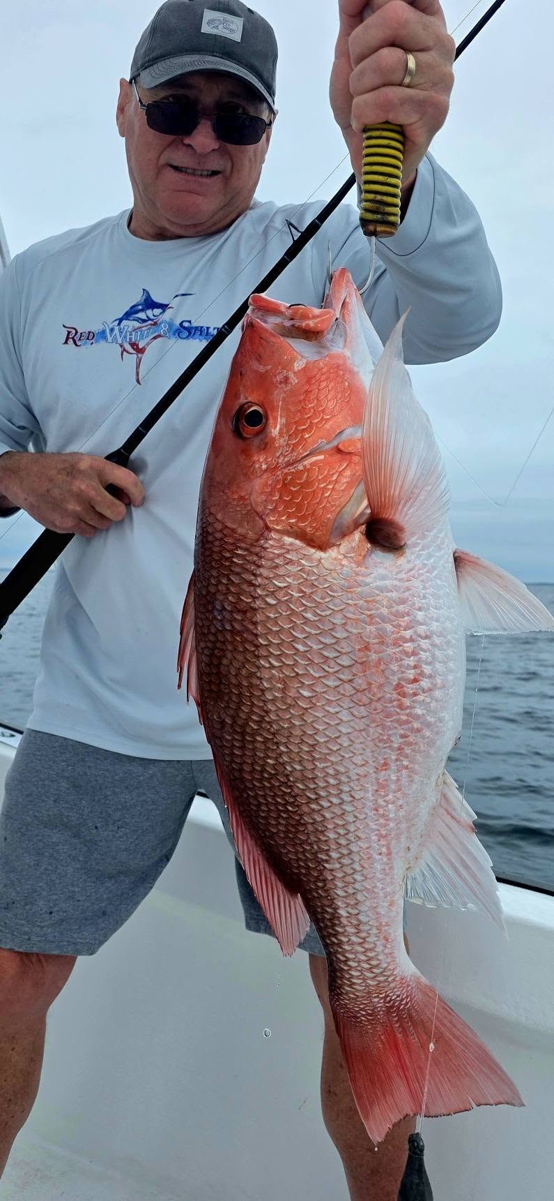 Red snapper catch displayed on fishing boat in Destin FL