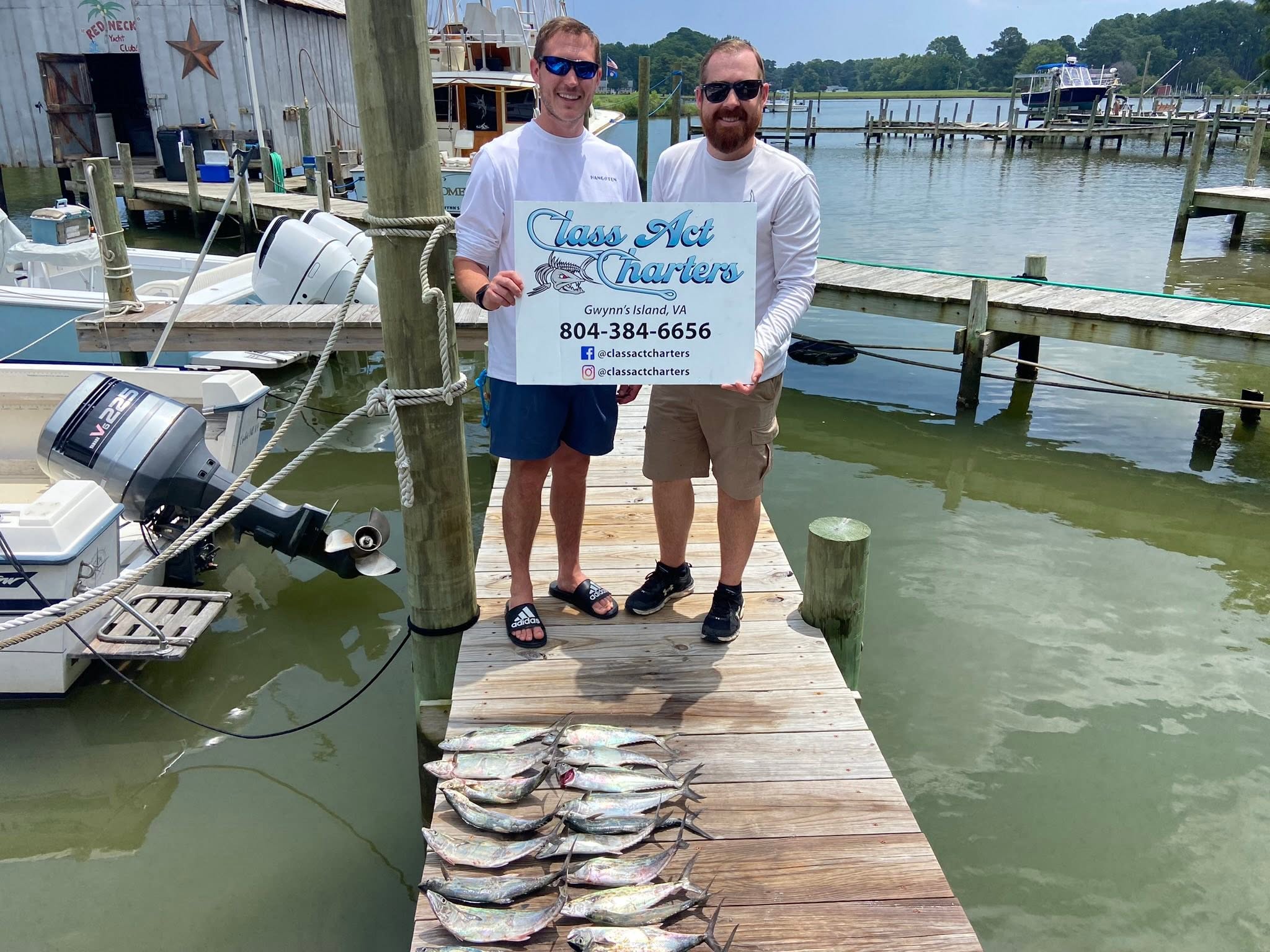 Fresh caught fish displayed on wooden dock at Gwynn Island VA marina