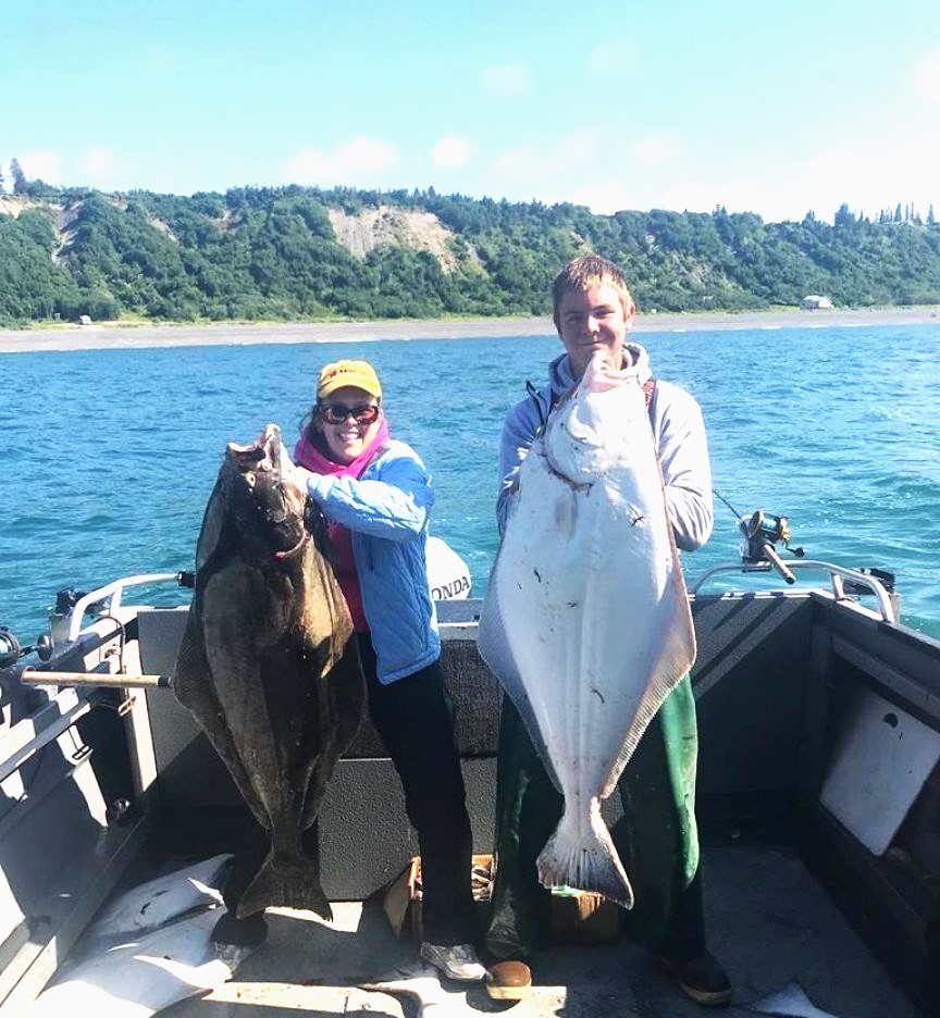 Two people fishing in Homer, Alaska