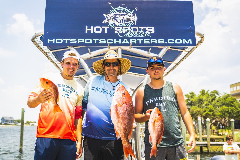 Half-day inshore fishing charter boat on Pensacola FL waters targeting redfish and speckled trout