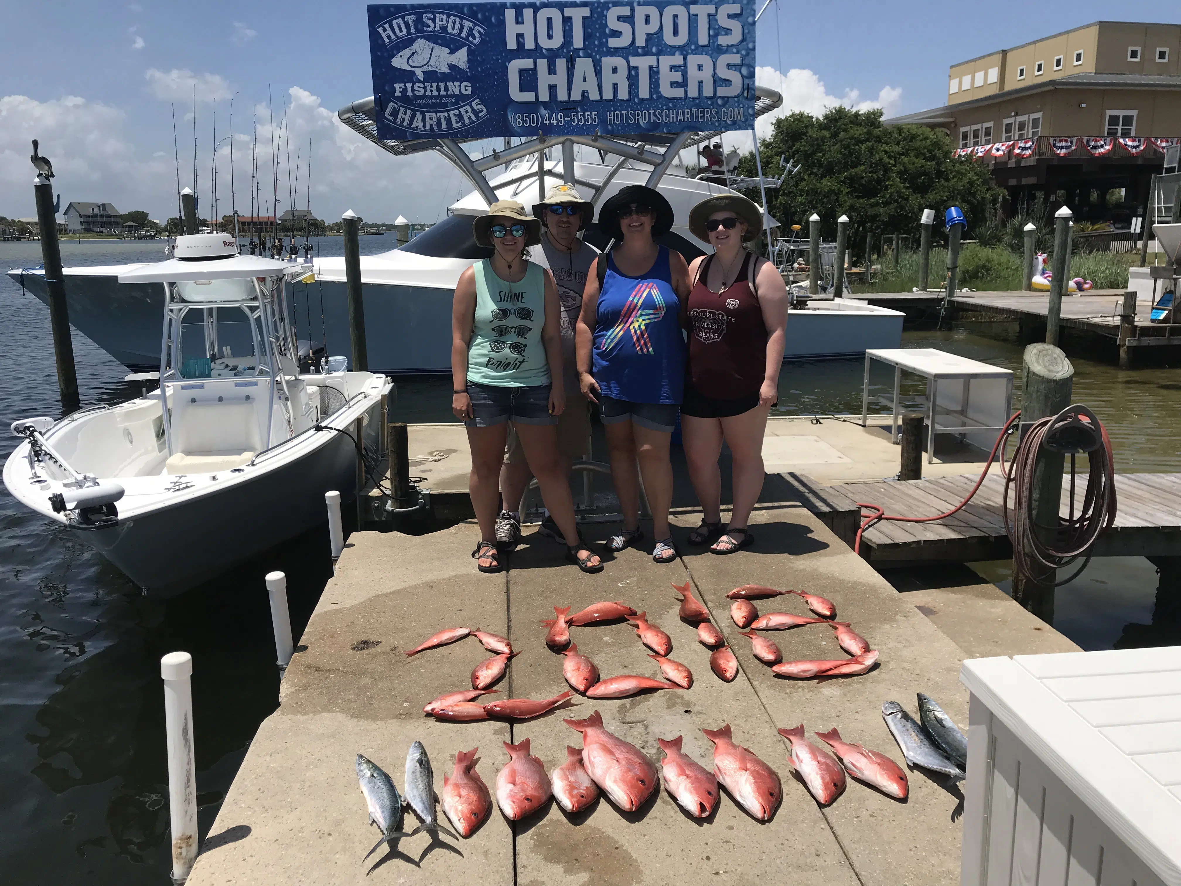 Pensacola FL inshore fishing charter boat targeting redfish and speckled trout in Gulf Coast waters