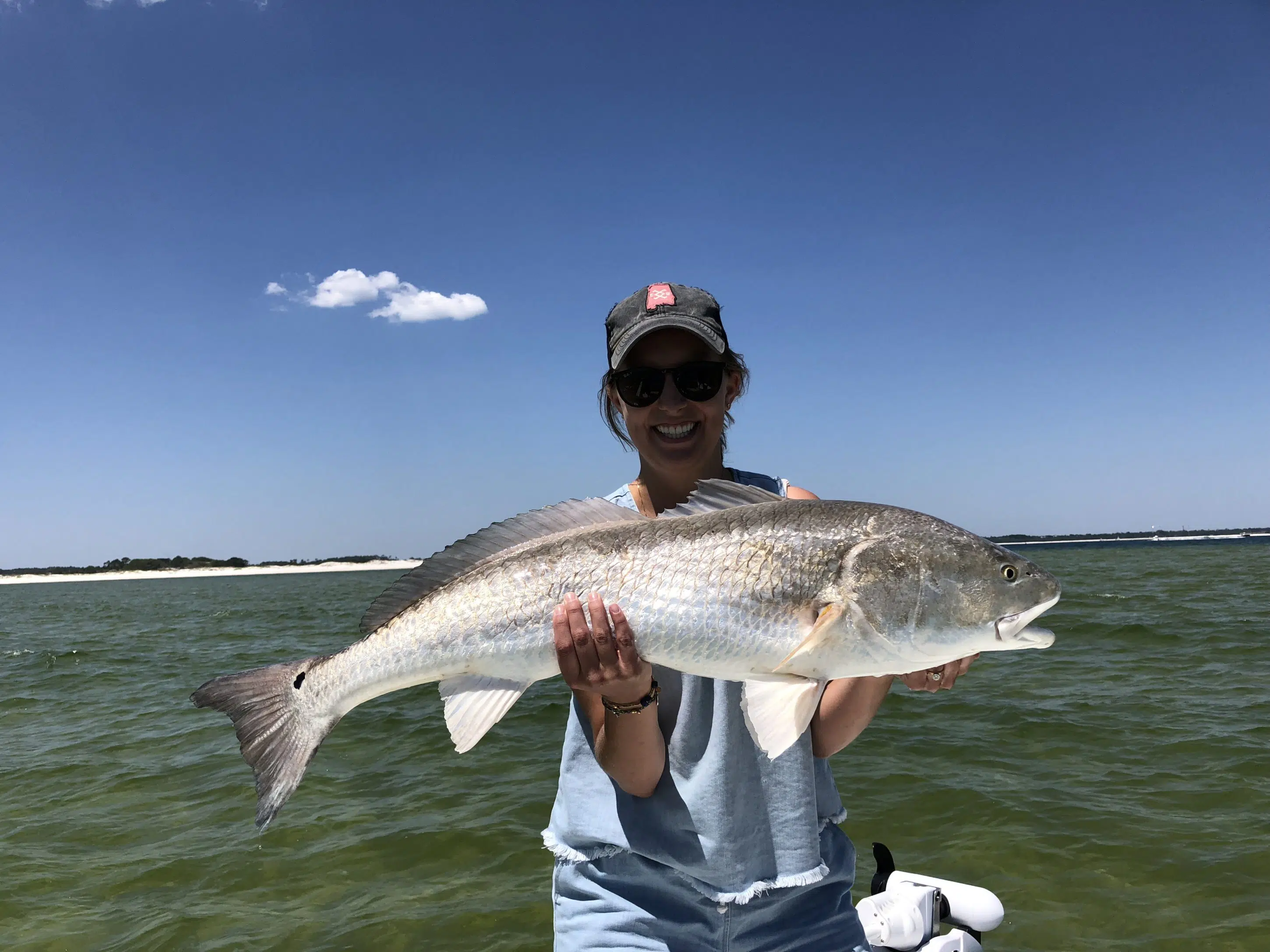 Pensacola inshore fishing charter boat targeting redfish and speckled trout in Gulf Coast waters
