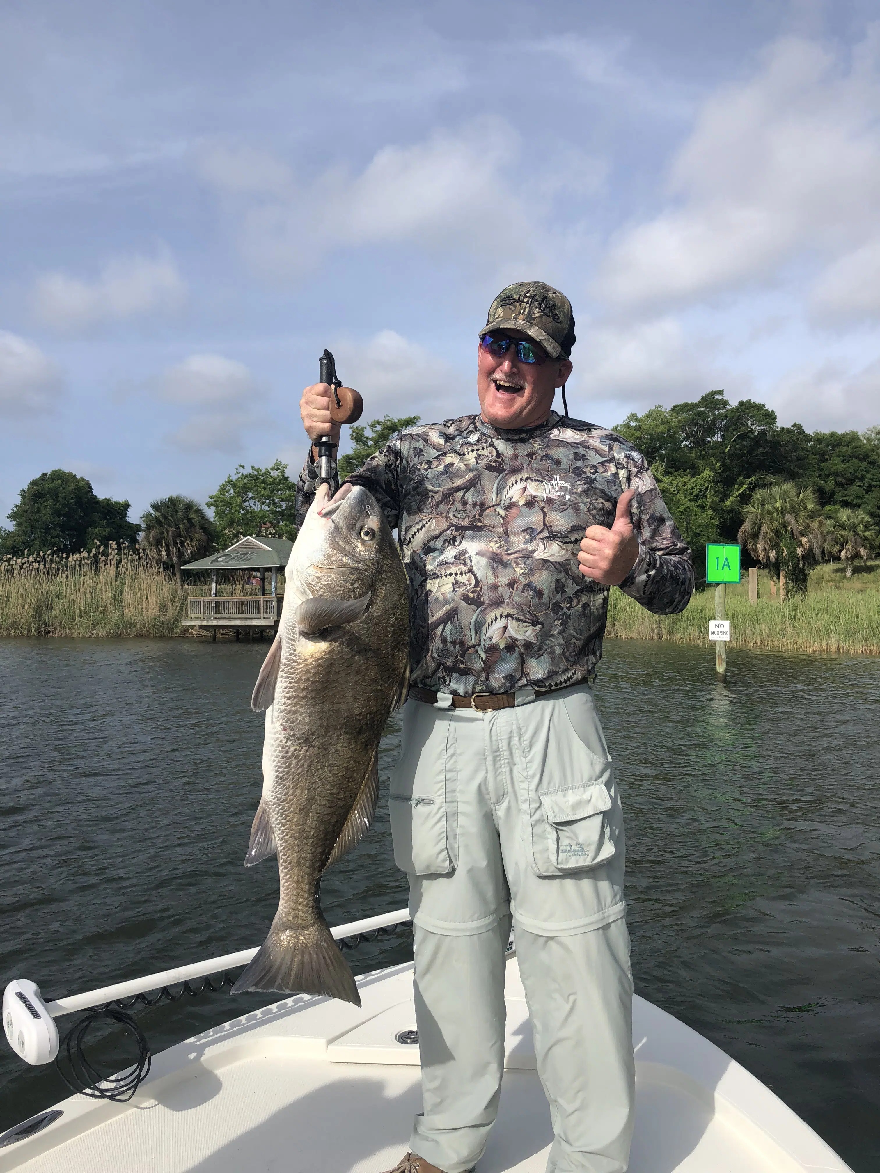 Half-day afternoon inshore fishing charter boat in Pensacola FL waters targeting redfish and trout